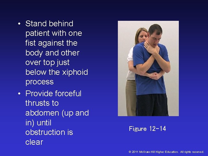 • Stand behind patient with one fist against the body and other over • Stand behind patient with one fist against the body and other over