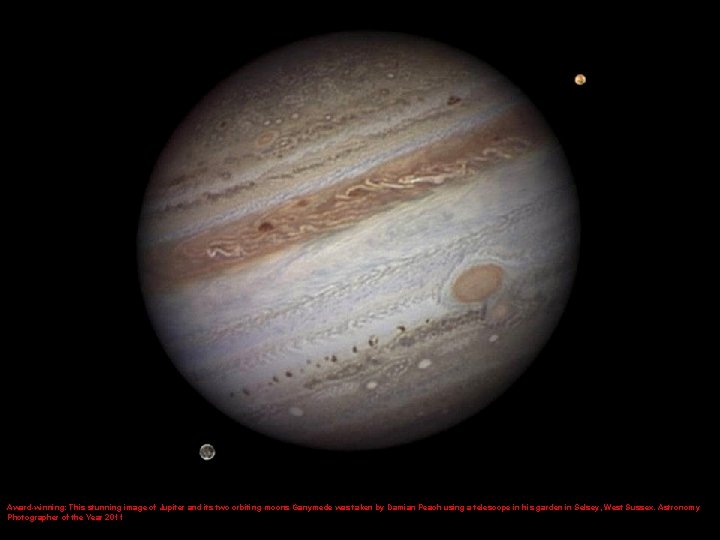 Award-winning: This stunning image of Jupiter and its two orbiting moons Ganymede was taken
