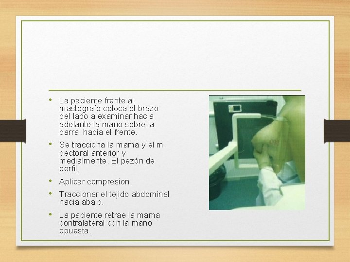  • La paciente frente al mastografo coloca el brazo del lado a examinar