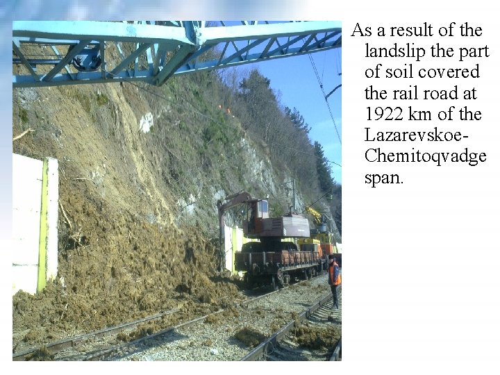 As a result of the landslip the part of soil covered the rail As a result of the landslip the part of soil covered the rail