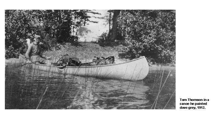 Tom Thomson in a canoe he painted dove grey, 1912. 