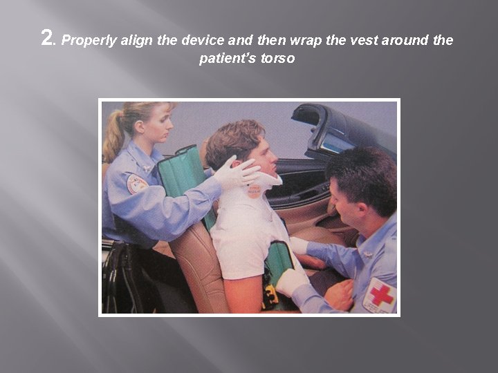 2. Properly align the device and then wrap the vest around the patient’s torso