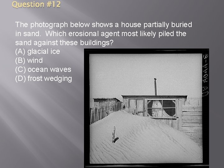 Question #12 The photograph below shows a house partially buried in sand. Which erosional