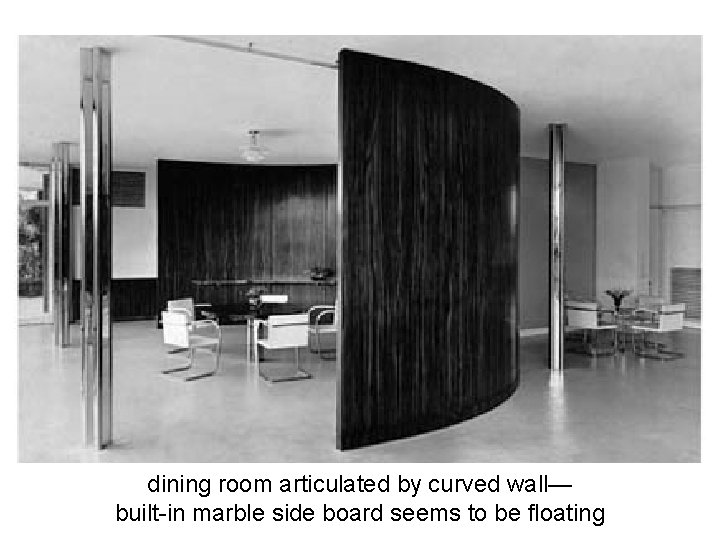 dining room articulated by curved wall— built-in marble side board seems to be floating