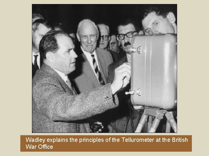 Wadley explains the principles of the Tellurometer at the British War Office 