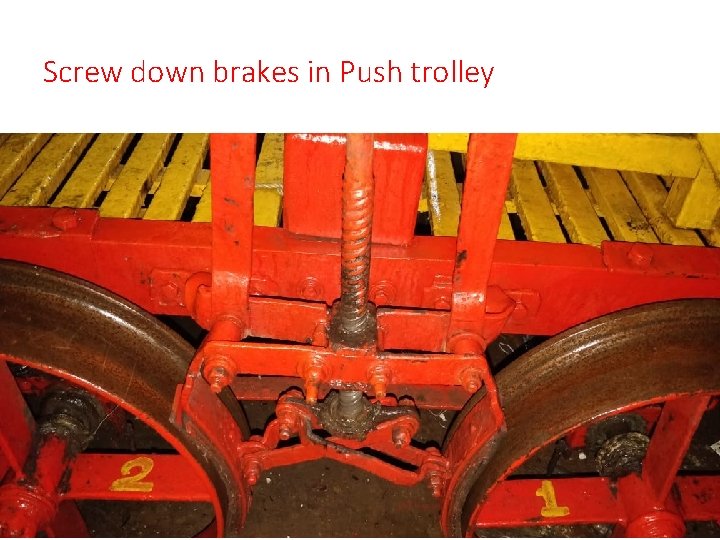 Screw down brakes in Push trolley 