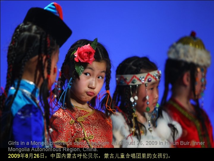 Girls in a Mongol children‘s chorus perform on August 26, 2009 in Hulun Buir,