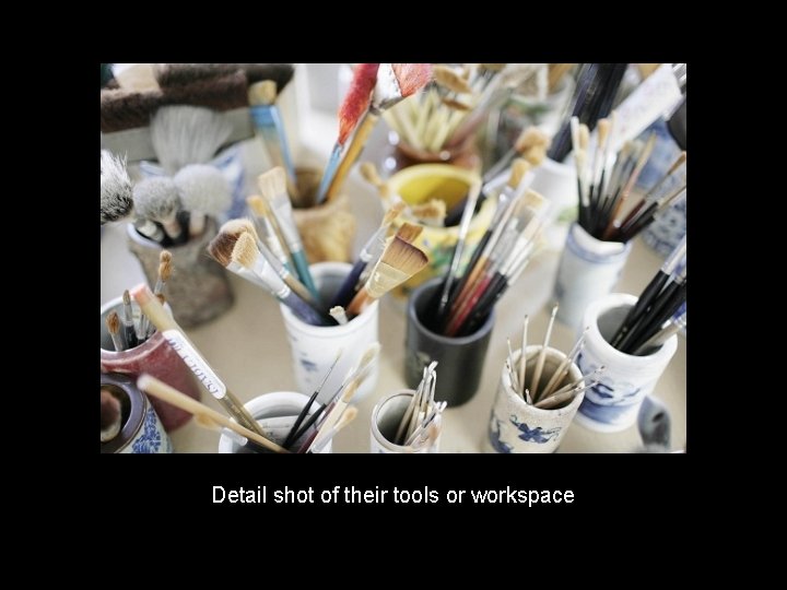 Detail shot of their tools or workspace 