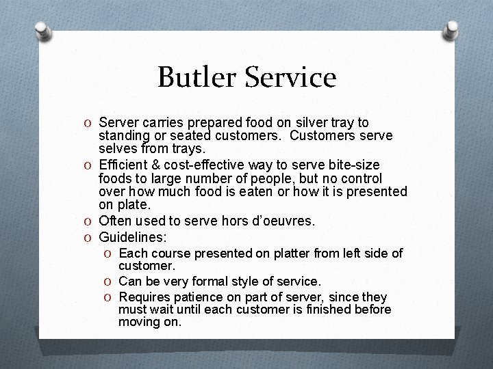 Butler Service O Server carries prepared food on silver tray to standing or seated
