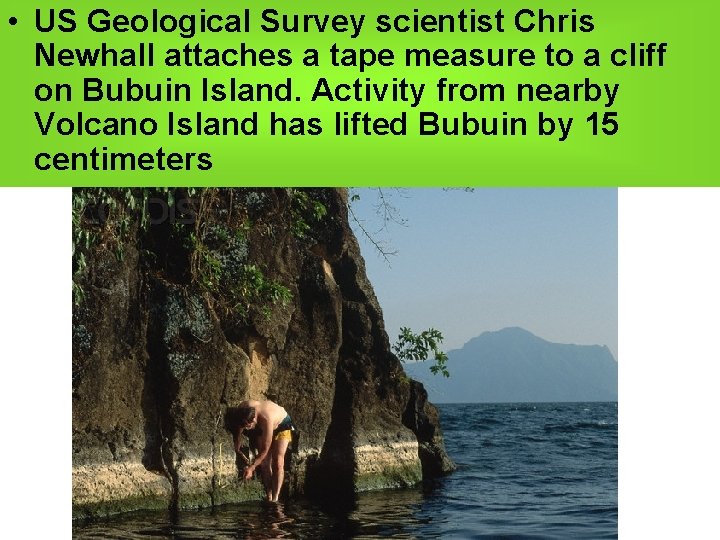  • US Geological Survey scientist Chris Mountain Building Newhall attaches a tape measure
