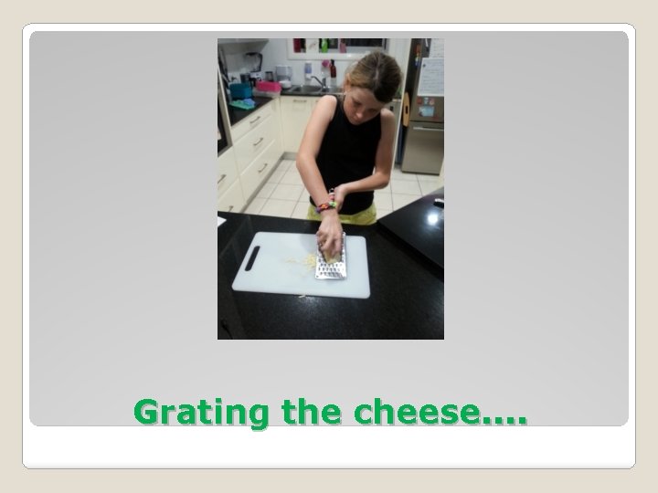 Grating the cheese. . 