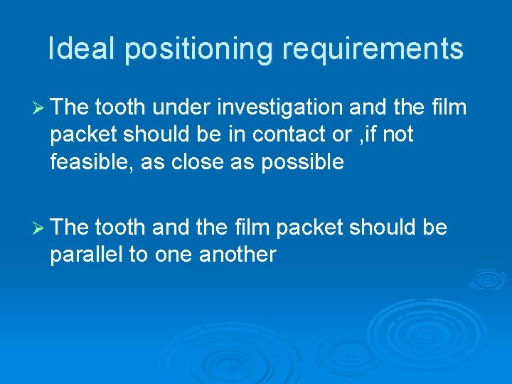 Ideal positioning requirements Ø The tooth under investigation and the film packet should be