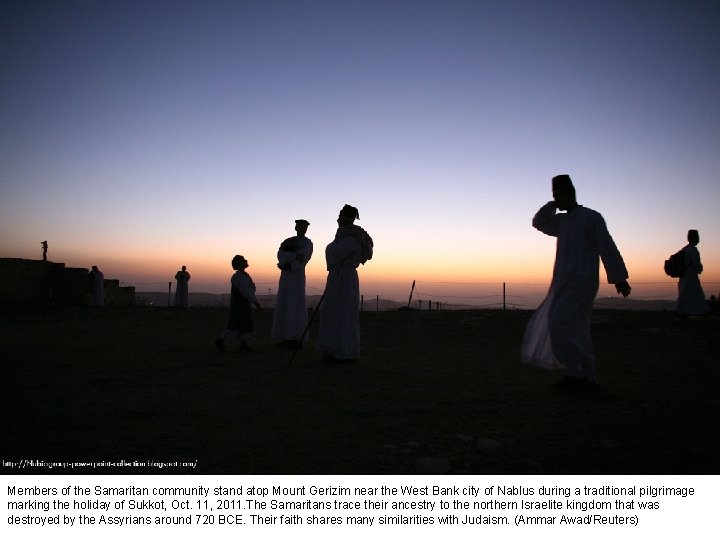 Members of the Samaritan community stand atop Mount Gerizim near the West Bank city