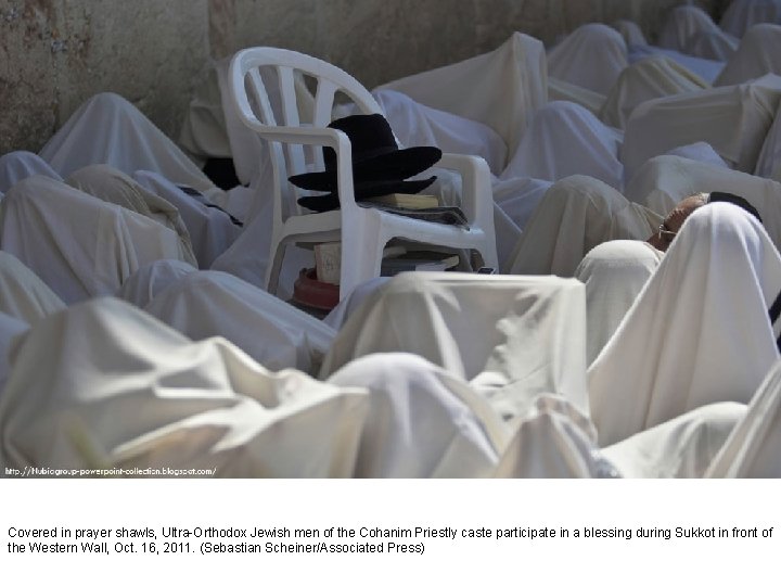 Covered in prayer shawls, Ultra-Orthodox Jewish men of the Cohanim Priestly caste participate in