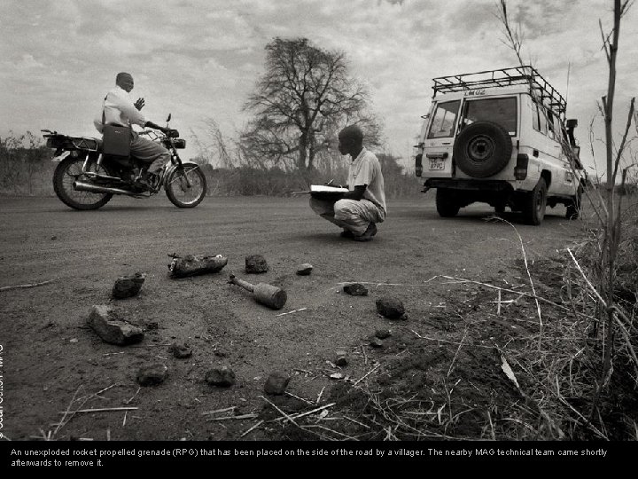 An unexploded rocket propelled grenade (RPG) that has been placed on the side of An unexploded rocket propelled grenade (RPG) that has been placed on the side of