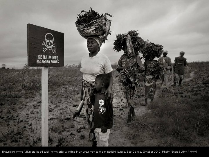 Returning home. Villagers head back home after working in an area next to the Returning home. Villagers head back home after working in an area next to the