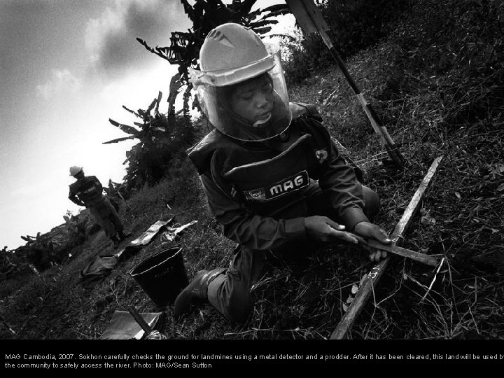 MAG Cambodia, 2007. Sokhon carefully checks the ground for landmines using a metal detector