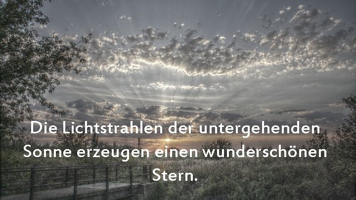 Die Lichtstrahlen der untergehenden Sonne erzeugen einen wunderschönen Stern. 