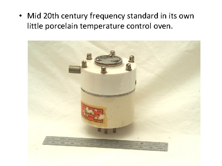  • Mid 20 th century frequency standard in its own little porcelain temperature