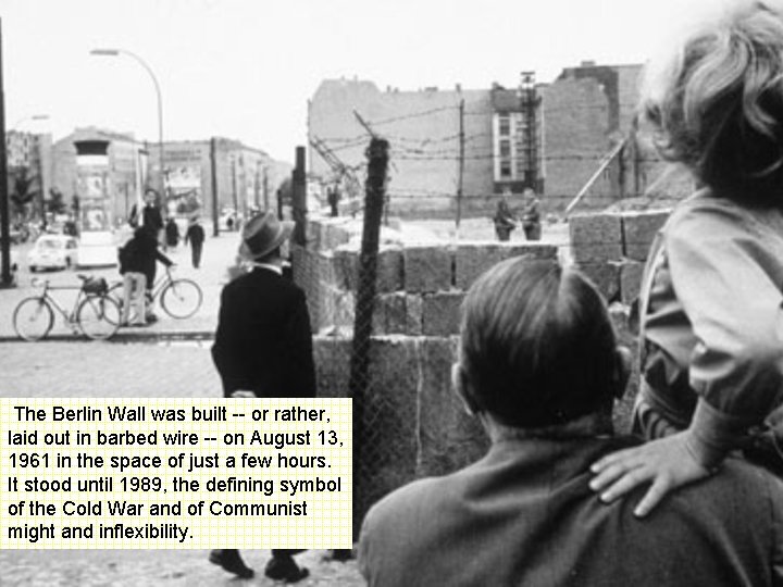  The Berlin Wall was built -- or rather, laid out in barbed wire