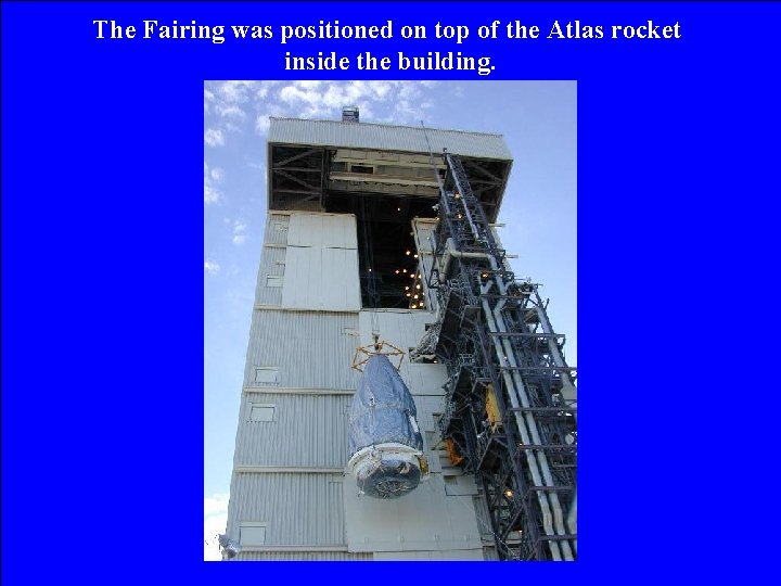 The Fairing was positioned on top of the Atlas rocket inside the building. 