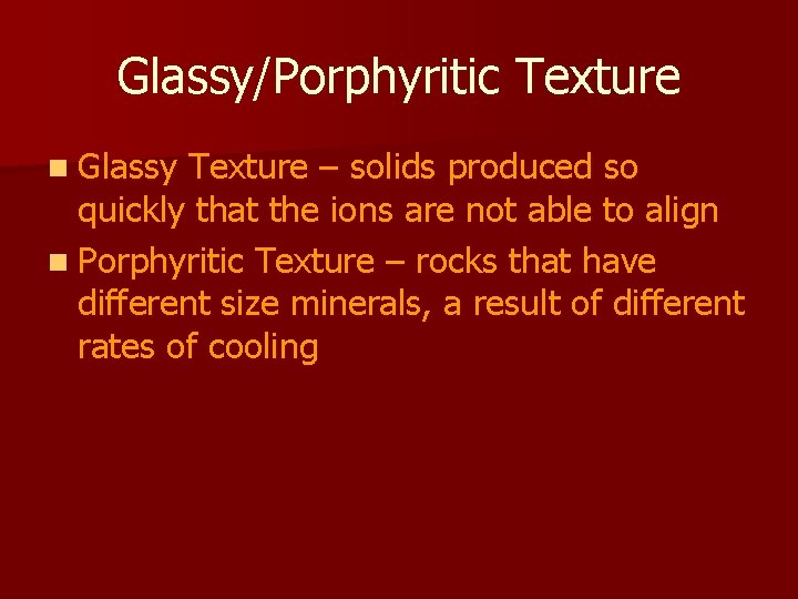 Glassy/Porphyritic Texture n Glassy Texture – solids produced so quickly that the ions are Glassy/Porphyritic Texture n Glassy Texture – solids produced so quickly that the ions are