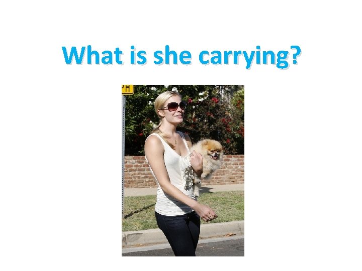 What is she carrying? 