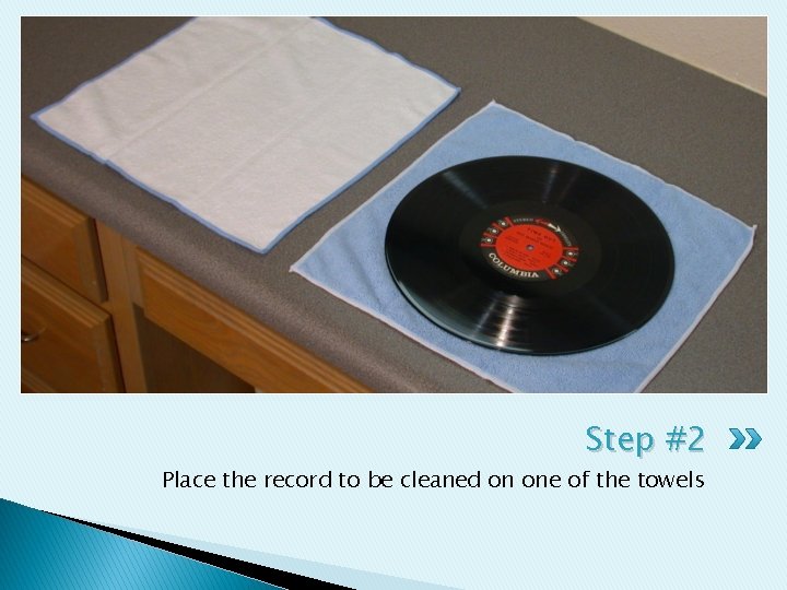 Step #2 Place the record to be cleaned on one of the towels 