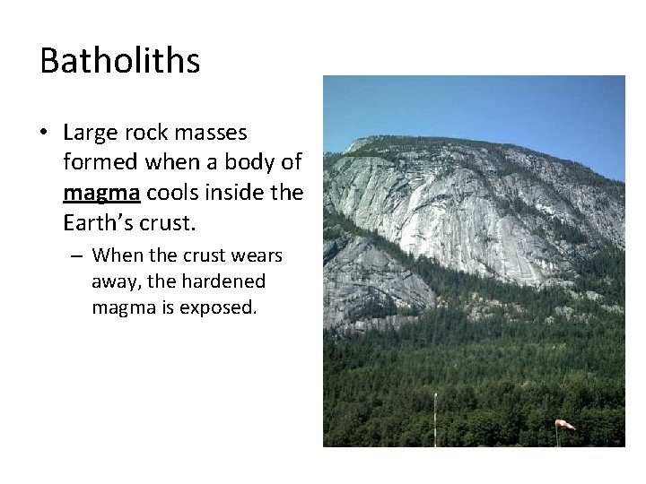 Batholiths • Large rock masses formed when a body of magma cools inside the