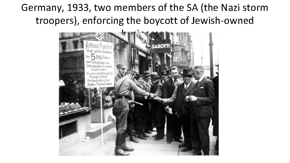 Germany, 1933, two members of the SA (the Nazi storm troopers), enforcing the boycott