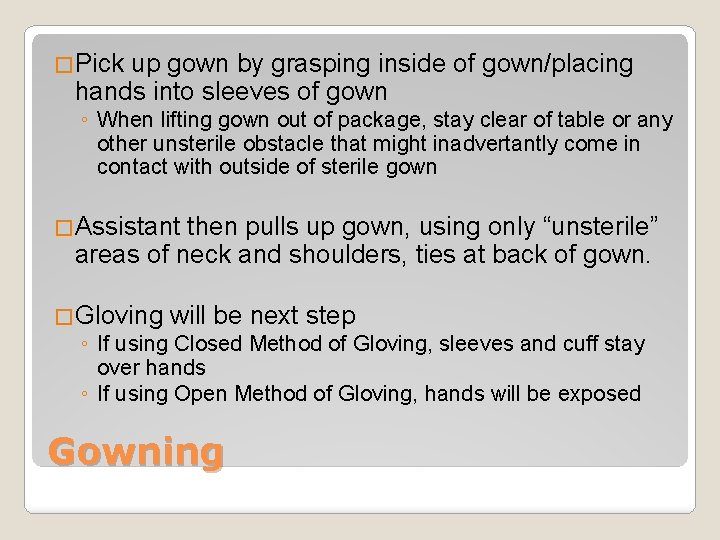 �Pick up gown by grasping inside of gown/placing hands into sleeves of gown ◦