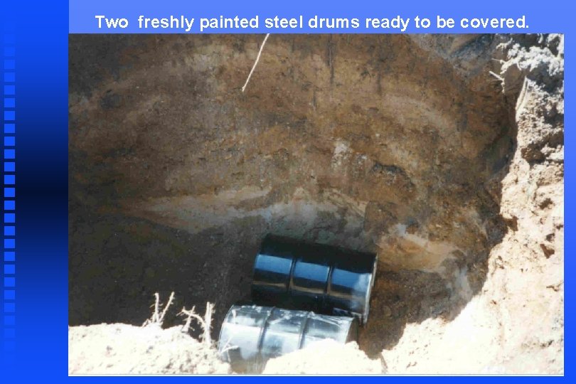 Two freshly painted steel drums ready to be covered. 