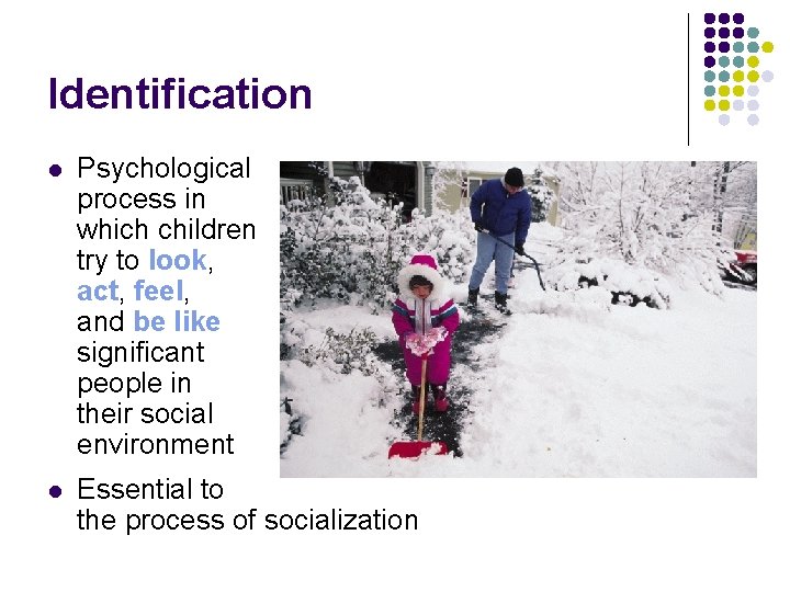 Identification l Psychological process in which children try to look, act, feel, and be