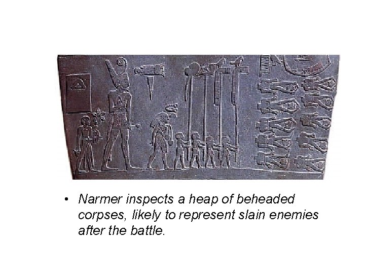  • Narmer inspects a heap of beheaded corpses, likely to represent slain enemies