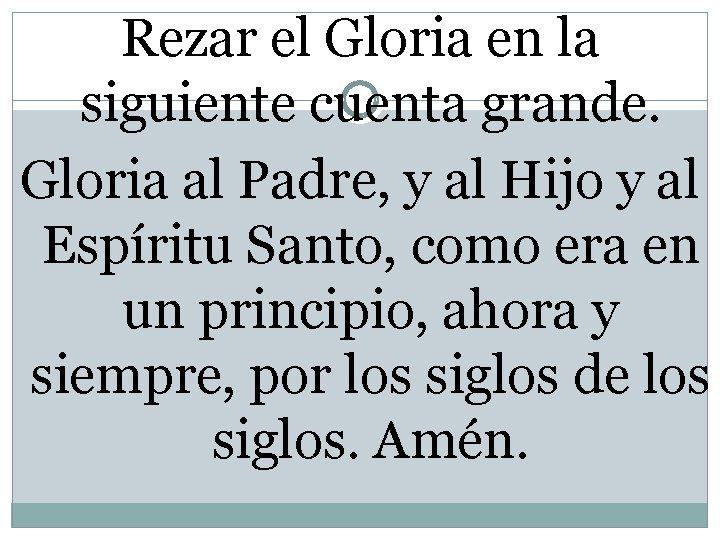 Rezar el Gloria en la siguiente cuenta grande. Gloria al Padre, y al Hijo