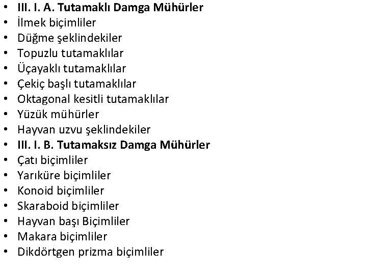 • • • • • III. I. A. Tutamaklı Damga Mühürler İlmek biçimliler • • • • • III. I. A. Tutamaklı Damga Mühürler İlmek biçimliler