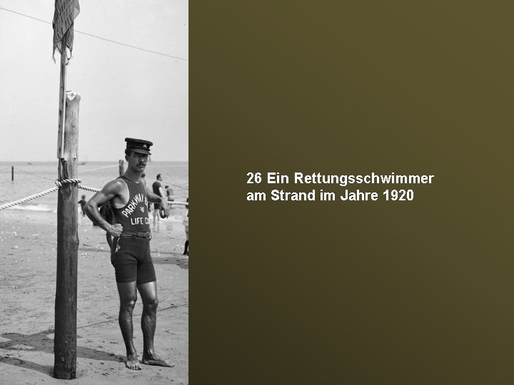 26 Ein Rettungsschwimmer am Strand im Jahre 1920 