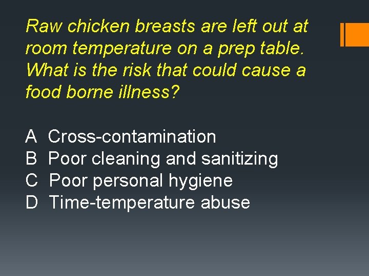 Raw chicken breasts are left out at room temperature on a prep table. What