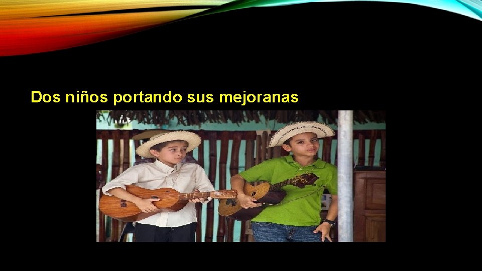 Dos niños portando sus mejoranas Dos niños portando sus mejoranas