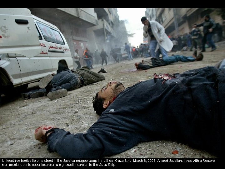 Unidentified bodies lie on a street in the Jabalya refugee camp in northern Gaza