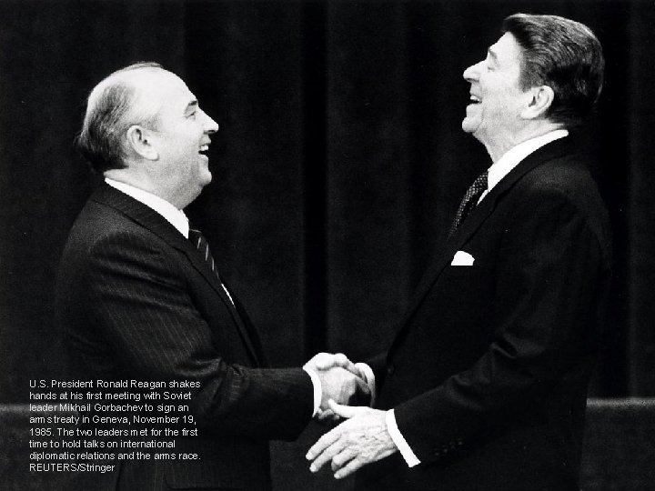 U. S. President Ronald Reagan shakes hands at his first meeting with Soviet leader