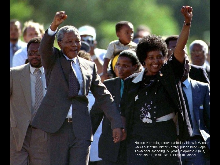 Nelson Mandela, accompanied by his wife Winnie, walks out of the Victor Verster prison