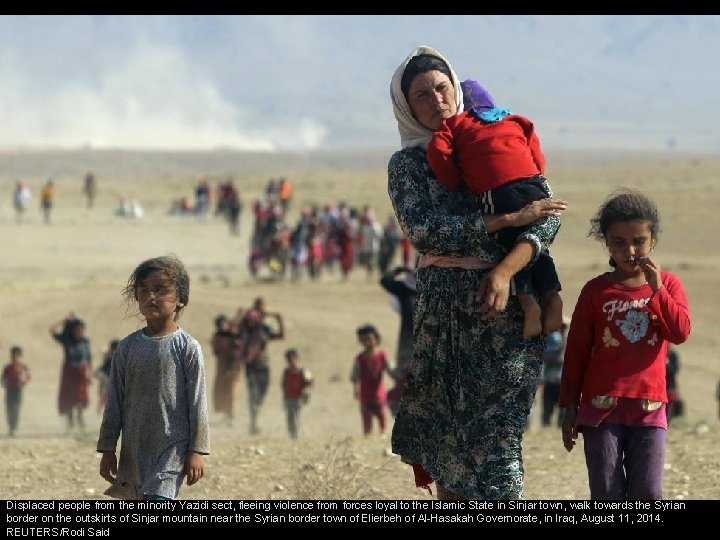 Displaced people from the minority Yazidi sect, fleeing violence from forces loyal to the