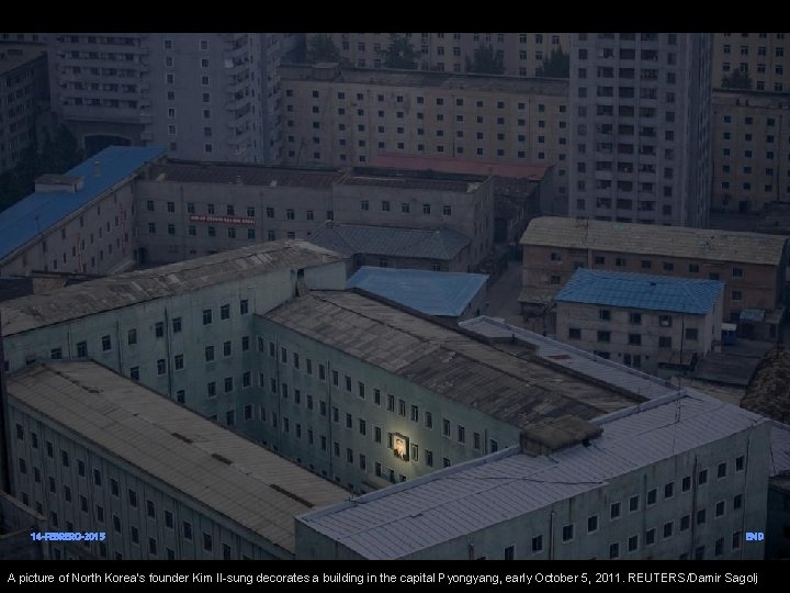 14 -FEBRERO-2015 END A picture of North Korea's founder Kim Il-sung decorates a building