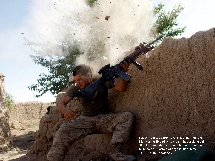 Sgt. William Olas Bee, a U. S. Marine from the 24 th Marine Expeditionary