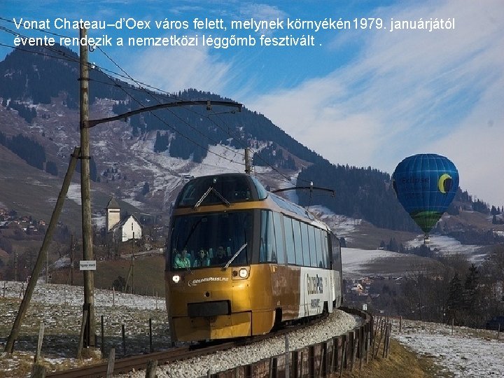 Vonat Chateau–d’Oex város felett, melynek környékén 1979. januárjától évente rendezik a nemzetközi léggőmb fesztivált.