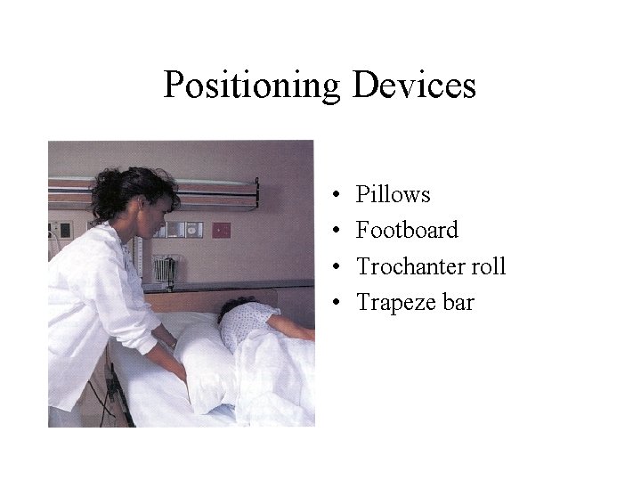 Positioning Devices • • Pillows Footboard Trochanter roll Trapeze bar Positioning Devices • • Pillows Footboard Trochanter roll Trapeze bar