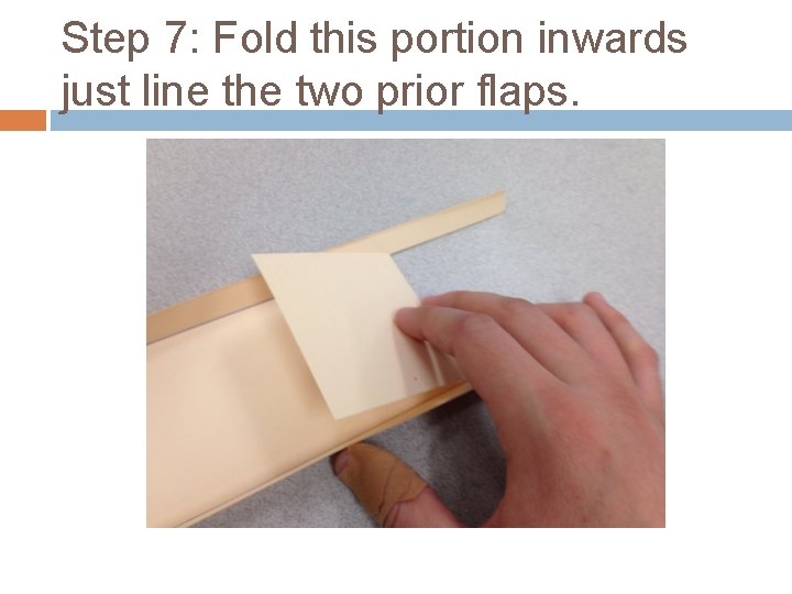 Step 7: Fold this portion inwards just line the two prior flaps. 