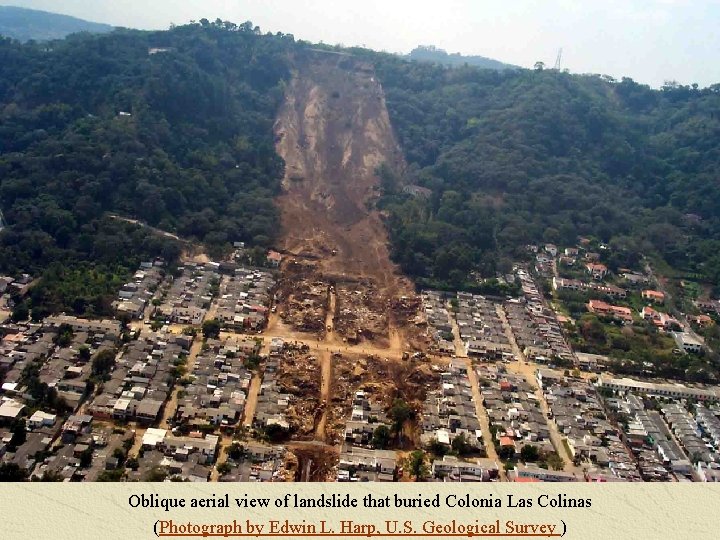 Oblique aerial view of landslide that buried Colonia Las Colinas (Photograph by Edwin L.