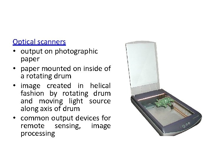 Optical scanners • output on photographic paper • paper mounted on inside of a